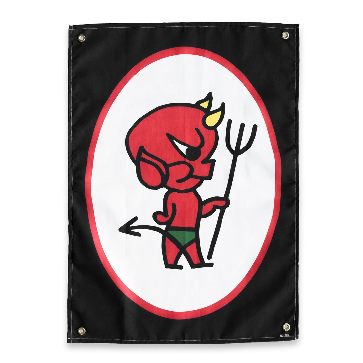 The "Devil" Wall Tapestry by No Fun®.  Tapestry is black, with a large red and white oval in the center.  There is a cartoon devil in the oval that is red, has yellow horns, and green shorts.  He is also holding a pitchfork.  There is a small "No Fun" logo in the bottom right hand corner.  There is one brass grommet in each corner of the tapestry.